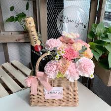 handbag basket of flowers with mini