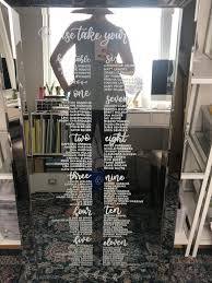 wedding seating chart on a mirror