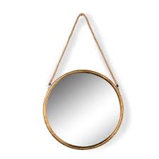 small gold mirror on rope round rustic