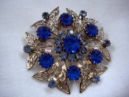 1950 s blue jewelled costume brooch