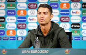 Portuguese footballer cristiano ronaldo plays forward for real madrid. Beverage Makers Mocked After Soccer Stars Ronaldo And Pogba Snub Drinks