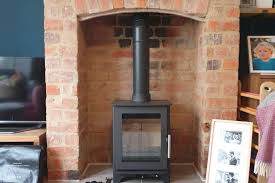 Red Brick Fireplace In Cirencester
