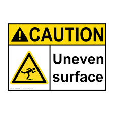 caution sign uneven surface ansi