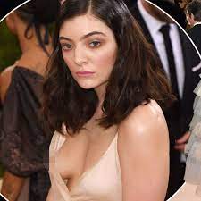 Lorde suffers unfortunate nip slip in her plunging pink tulle gown on Met  Gala red carpet 