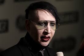 Marilyn Manson surrenders to police for ...