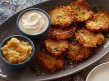 What is traditionally served with potato latkes?