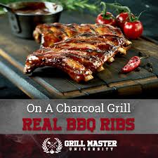 real barbecue ribs on a charcoal grill