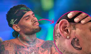 Now that he has no room on his arms & chest, expect more back tats soon! Chris Brown Shows Off Controversial Sneaker Face Tattoo In First Close Up Photo Capital Xtra