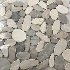 tan flat pebble tile 12 x12 rock stone