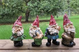4 Garden Gnomes Giving Middle