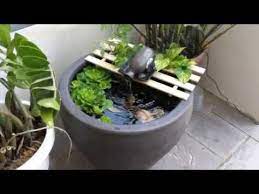 A miniature waterfall allows you to bring the soothing sound of a trickling stream indoors. Diy Mini Fountain For Pot Pond Youtube Mini Fountain Diy Fountain Diy Water Fountain