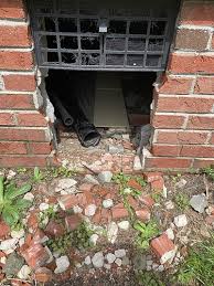 Large Hole Knocked In Foundation Wall
