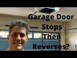 garage door opener stops and reverses
