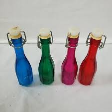 Set Of 4 Colored Glass Bottles With