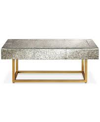 A bold, modern take on the classic coffee table, this striking. Nathaniel Antique Mirrored Brass Coffee Table