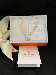 pearl necklace with lenca pendant from