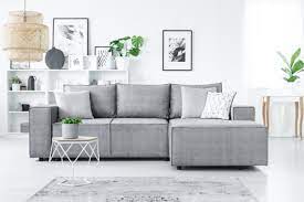 to arrange cushions on a corner sofa