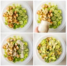 How to make caesar salad dressing whisking ingredients together . Avocado Caesar Salad With Cucumbers No Egg Dressing Little Broken