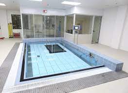 movable swimming pool floor