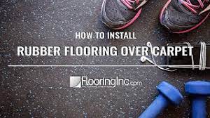 install rubber flooring over carpet