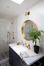 Round Bathroom Mirror With Light Above Image Of Bathroom And Closet