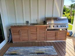 Here at outdoor kitchen cabinets, our goal has been to offer something a little different. Newage Outdoor Kitchen 4 Piece Set With 40 Inch Insert Grill Cabinet Sink And Bar Center Walmart Com Walmart Com