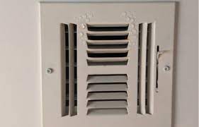 what causes condensation on ac vents