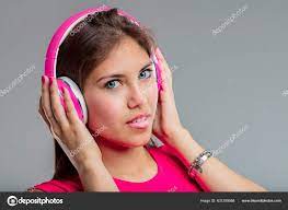 Young Woman All Pink Listens Her Headphones Also Pink She Stock Photo by  ©Giulio_Fornasar 631259568