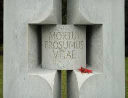 Detail of the communal grave for body donors at Bremgarten cemetery, Bern, Switzerland. The inscription reads: "Even in death do we serve life".