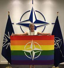 The flag of the north atlantic treaty organization (nato) consists of a dark blue field charged with a white compass rose emblem, with four white lines radiating from the four cardinal directions. Rose Gottemoeller On Twitter Proud To Mark Idahot2017 Today Nato Is Committed To Diversity And Inclusion These Values Make Us Stronger And Safer Https T Co Wr6oxmn4qu