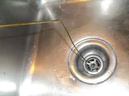 unclog a double kitchen sink drain