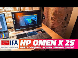 You do not need to link the 2 monitors to each other via a cable. Hp Omen X 2s Dual Screen Gaming Laptop First Impressions Ndtv Gadgets 360