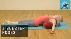 3 yoga poses using a bolster to re