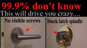 Remove door lock without visible screws and stuck latch spindle - YouTube