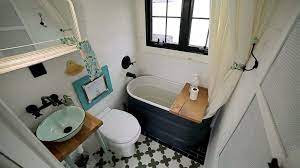 The shower stall is partially open. 5 Fab Tiny House Bathroom Ideas Tiny House Blog