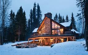 a mountain timber frame home nestled on