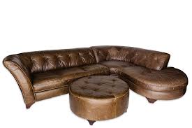 a 06 brown leather curved sectional