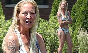 Eminem's ex-wife Kim Mathers looks healthy in white-and-blue bikini | Daily  Mail Online