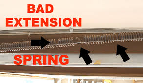 replace garage door extension springs