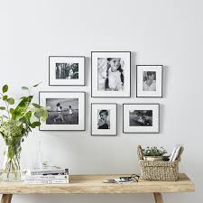 Is there anything hotter in interior design right now than gallery walls?? Fine Black Small Picture Gallery Wall Photo Frames The White Company Uk
