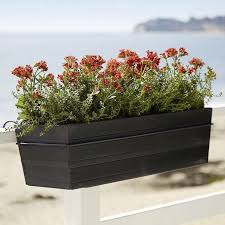 Hanging just outside your backdoor or within your mudroom, this rustic box planter is the perfect way to make your herb garden synonymous with your style. 10 Easy Pieces Black Balcony Box Planters Gardenista