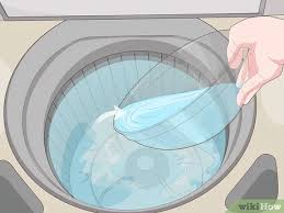 Remove the four screws and the back panel. 3 Ways To Fix A Washer That Won T Drain Wikihow