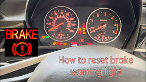 how to reset brake warning service
