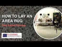 area rug over carpet flooring