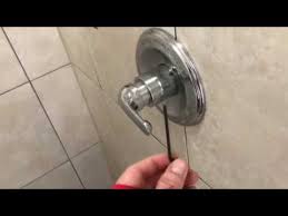 fix leaky shower head with a stuck