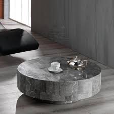 Apart from the open shelf in the middle, it sports two subtly. Modern Round Coffee Table With Drawers