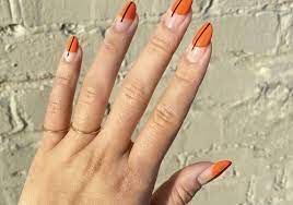 Pair it with a crystal floral design, and the look is strong yet feminine. 26 Orange And Black Nail Designs You Can Wear All Season
