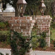 Here are the finished airstone spring creek driveway entrance columns sporting pretty christmas wreaths. Home Carolina Lanterns And Lighting Brick Driveway Brick Columns Driveway Entrance