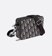 Lapg stocks many types of cases and pouches that can be used by themselves or attached to a larger bag. Pouch With Shoulder Strap Beige And Black Dior Oblique Jacquard Leather Goods Man Dior Luxury Bag Men Mens Bags Fashion Mens Designer Bag