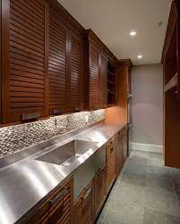 Replacing kitchen cabinet doors can be a good way to get a completely new style with brand new material, and it's the best option if your cabinet doors are in really bad shape. Louvered Kitchen Cabinet Door Styles Cabinet Door Styles Laundry Room Design